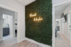 Modern 2024 Townhome with Indoor Hoops Huge TVs and Gray Chic Design